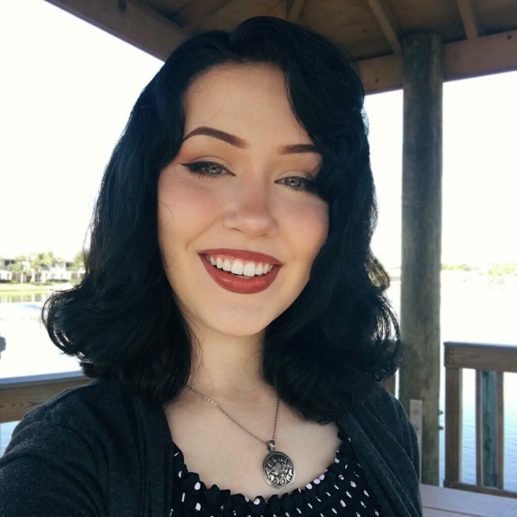 dark haired woman smiling