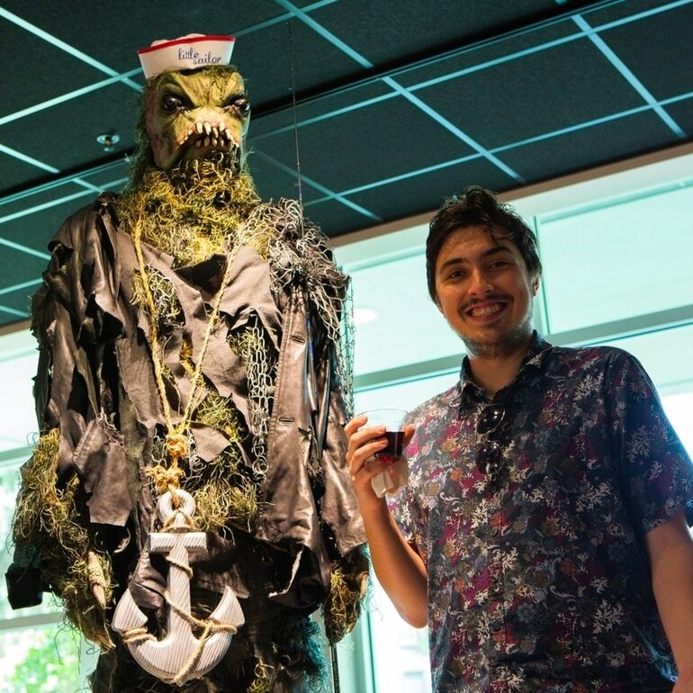 man standing near swamp monster
