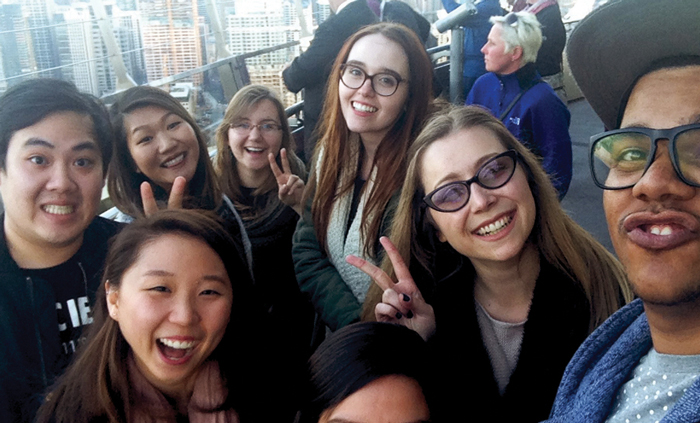 Students Smiling While Taking a Photo