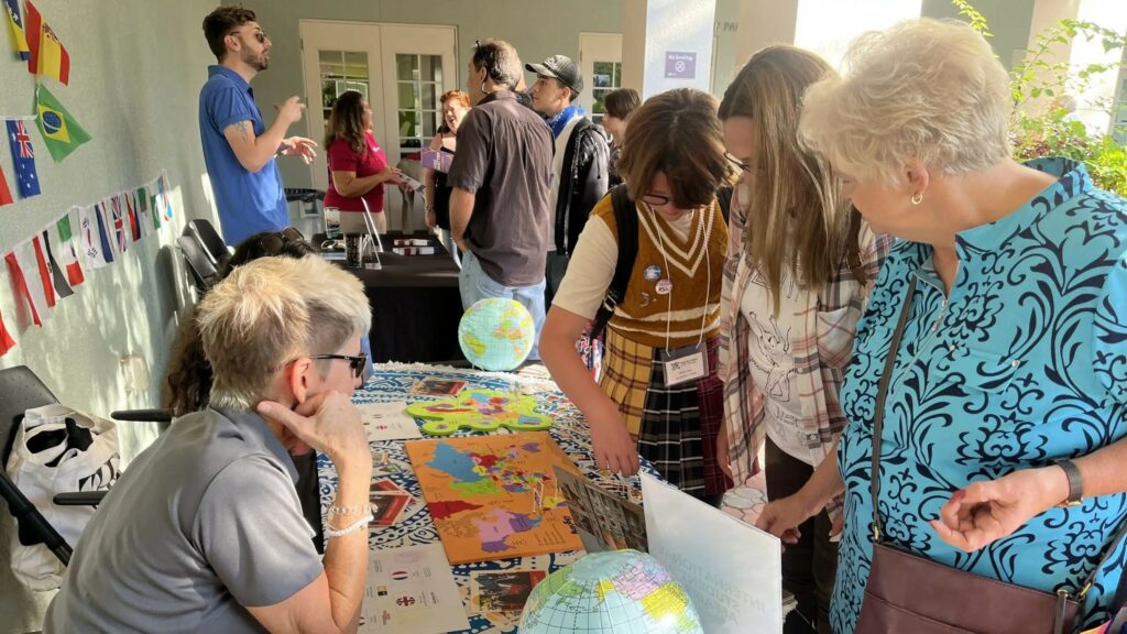 A prospective student and her family talk with staff from the Office of International Student Affairs at the Fall 2022 Open House. More than 20 percent of current Ringling College students come from countries other than the United States.