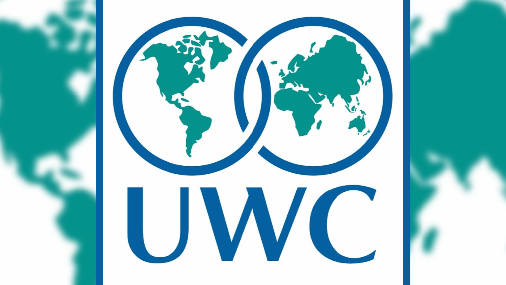 Graphic logo with two interlinked circles each depicting different sides of the globe with letters UWC.