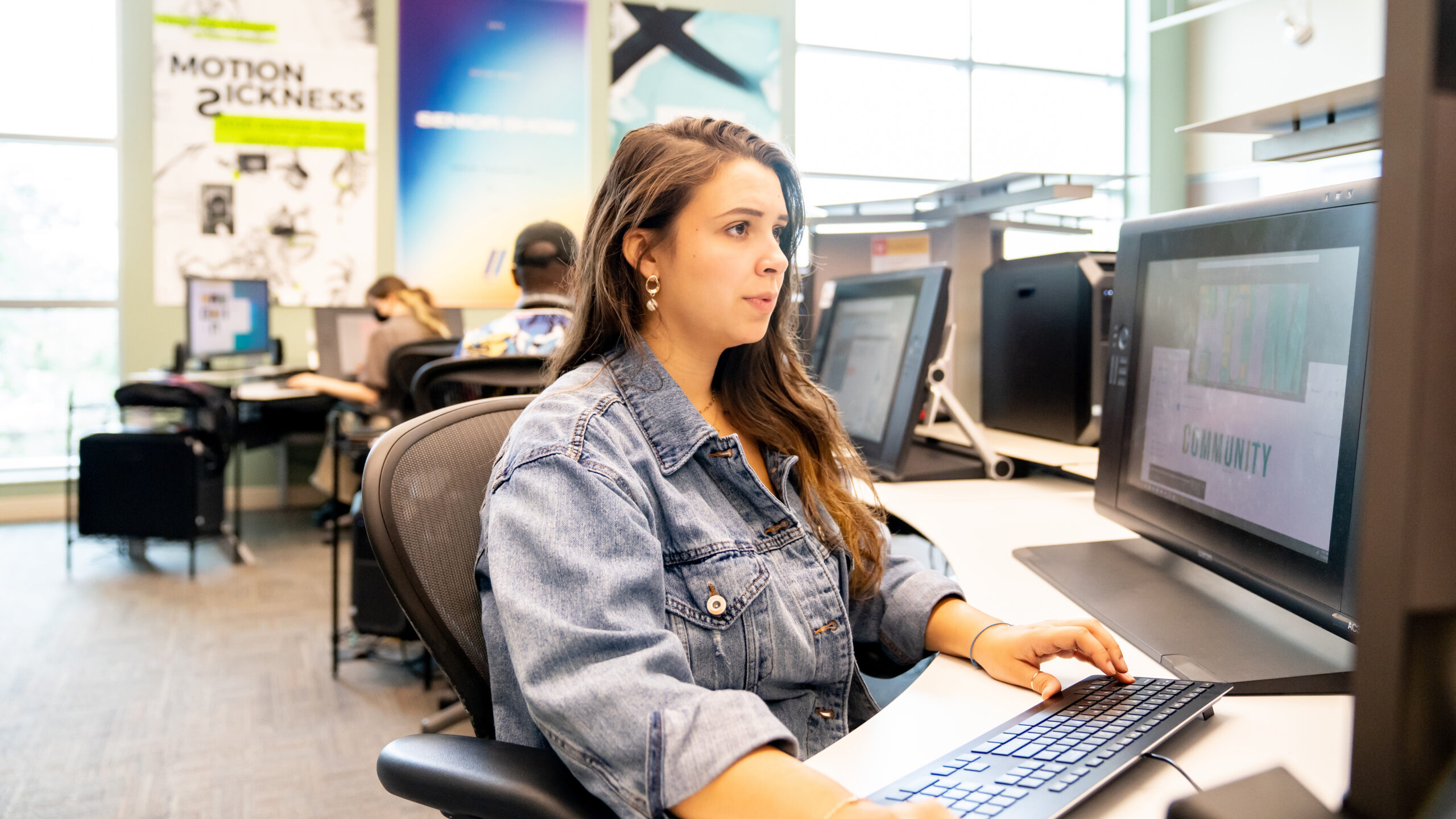 Motion Design student Jessica Buck working in a Motion Design classroom.