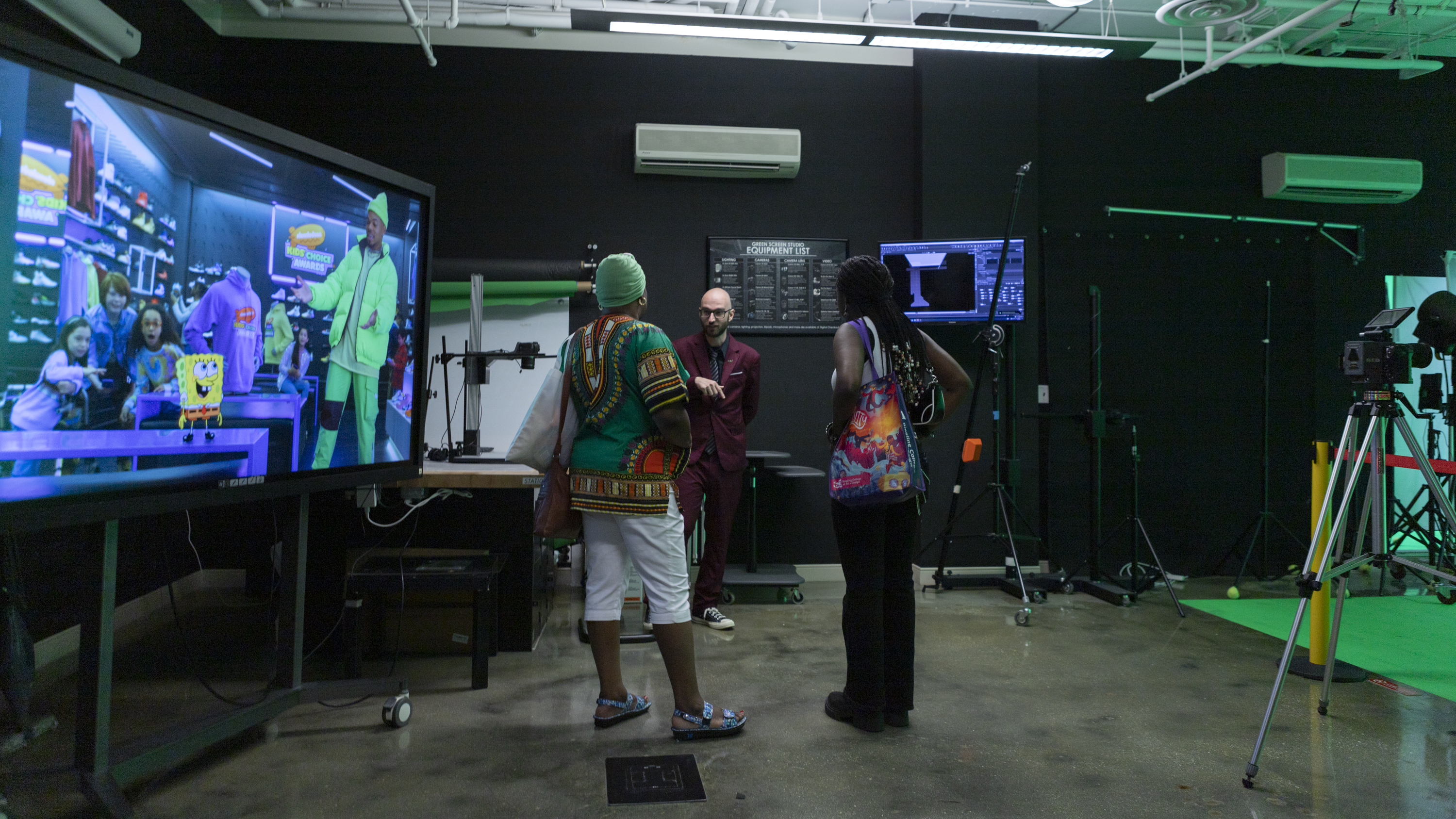 An accepted student and their family explore the Film facilities at Ringling College.