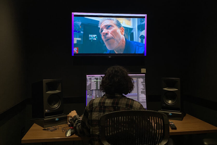 Booker student working in a post-production suite at the Studio Labs.