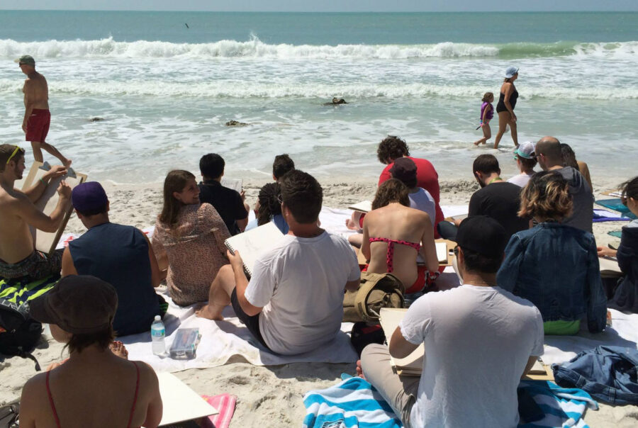 Motion Design majors spend the day drawing at the beach.