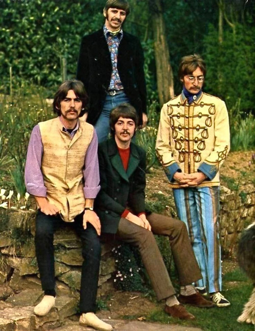 1960s musicians wearing colorful and eclectic fashion outdoors