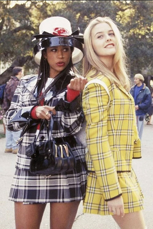 1990s women wearing plaid and minimalist street fashion outdoors