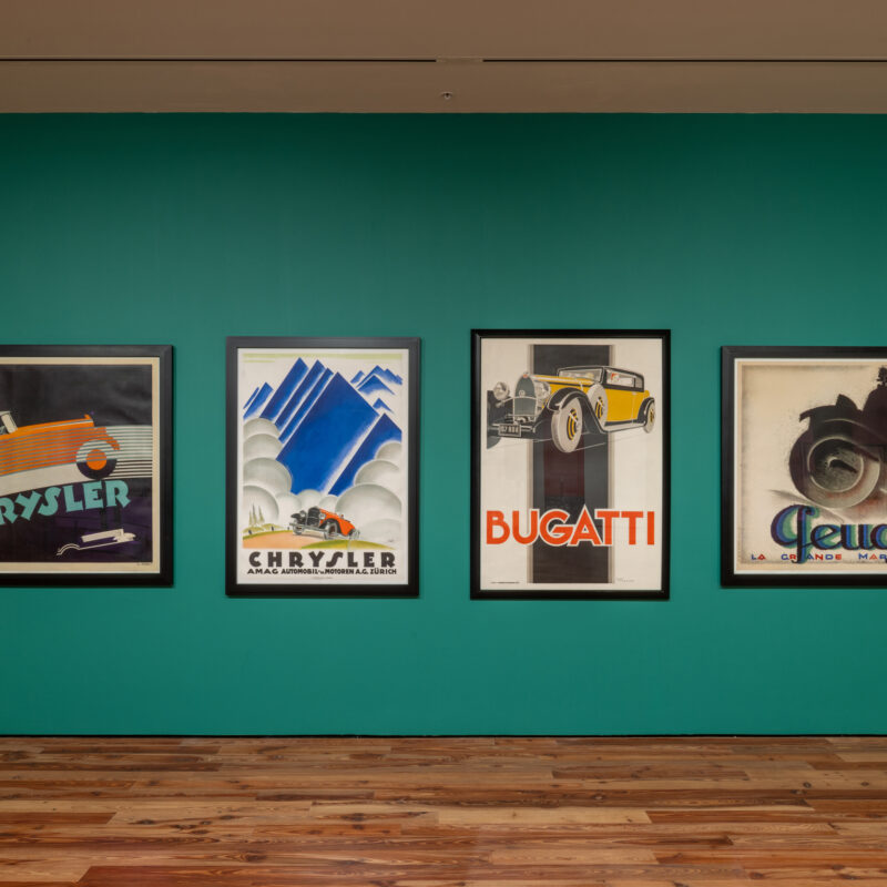 posters on green wall