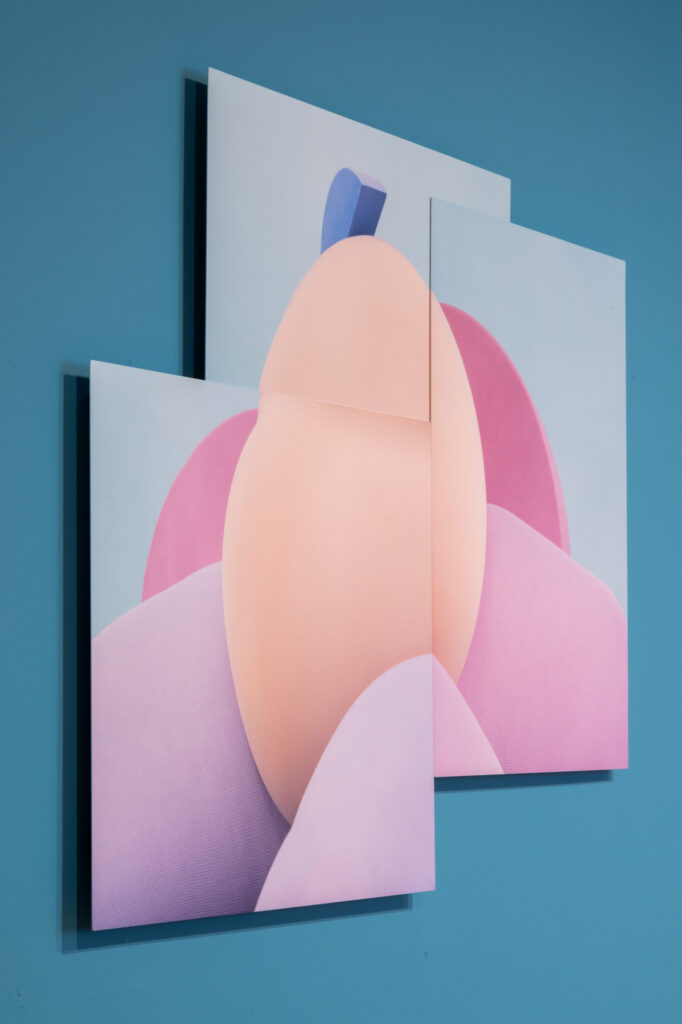 photographic collage in pinks, purples, and orange with blue background on blue wall. 
