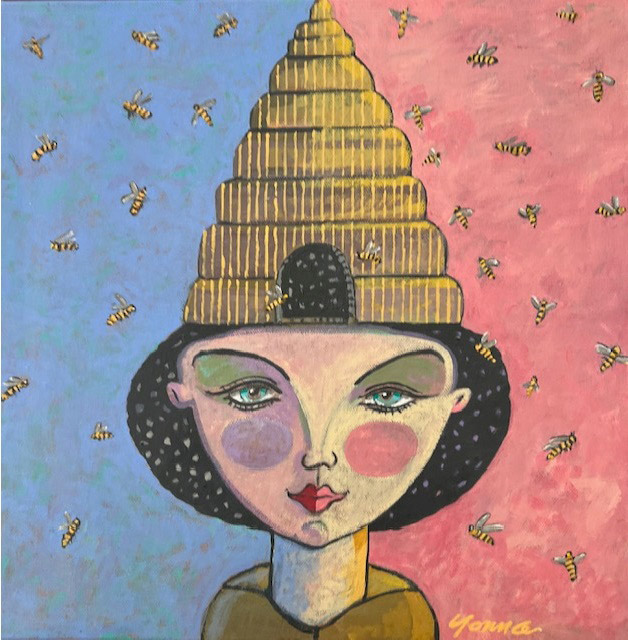 Whimsical portrait of a woman wearing a beehive-shaped hat with bees flying around against a split blue and pink background
