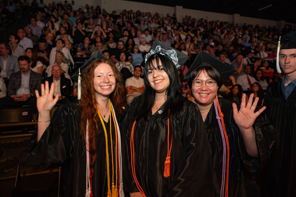 Commencement Celebration Graduates posing together before the commencement ceremony.