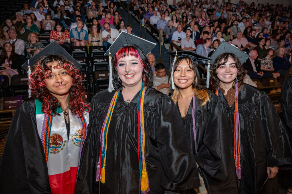 2026 Ringling Graduates Group of graduates smiling during Ringling College commencement.