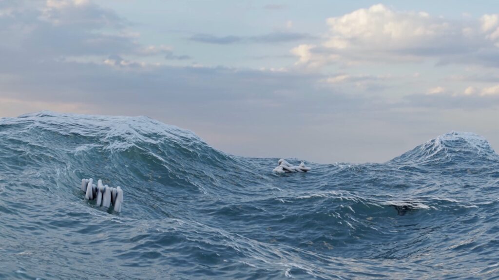 film still of ocean waves with fingerlike objects floating in clusters