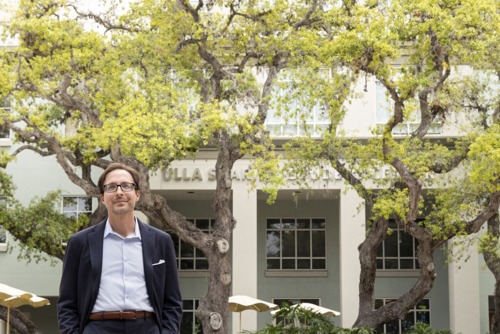 Ringling College's Seventh President, Dr. Davis Schneiderman, posing on Scott Plaza
