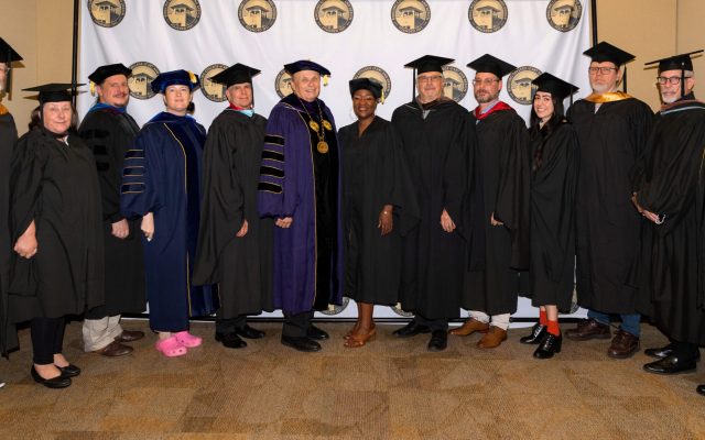 Dr. Larry R. Thompson, President, Ringling College of Art and Design, Dr. Jacinda Walker, 2022 Commencement Speaker, Faculty, and Staff before the ceremony.